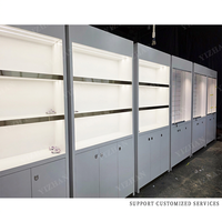Kiosque de présentation de lunettes en acier inoxydable avec verre trempé, éclairage LED, acrylique et LED pour les magasins de détail et les centres commerciaux