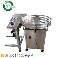 Machine de collecte et de déscramblement de bouteilles carrées pour convoyeur tournant