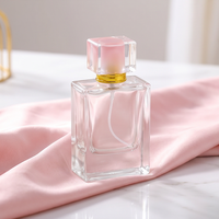 Flacon de parfum en verre transparent carré de 50 ml, à fond épais, rechargeable, avec pompe pulvérisatrice, emballage personnalisable, couleur personnalisée