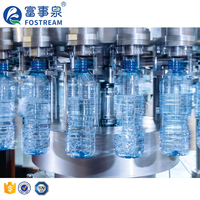 Machine de remplissage, de bouchage et d'emballage entièrement automatique pour bouteilles d'eau minérale de 500 ml