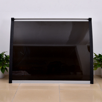 Guansu personnalisé en usine 60*150cm auvent extérieur de fenêtre de porte Pc en polycarbonate avec gouttière