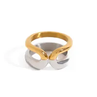 Mode féminine MW Bague étanche en acier inoxydable plaqué or 18 carats bicolore à double couche en forme de X avec lignes simples et élégantes