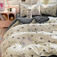 Ensemble de literie en coton lavé avec nœud noir et cœur - Ensemble de literie doux et confortable en 4 pièces pour la chambre des filles