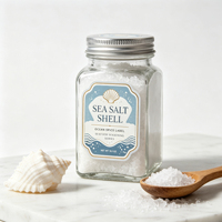Étiquettes personnalisées en rouleau bleu clair avec feuille d'or, autocollants coquillage et sel marin pour l'emballage des pots d'assaisonnements de fruits de mer, impression