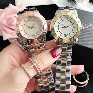 2022 cheap charm wrist watch for women new fashion Hip hop watches Gold bracelet strap luxury men quartz watches