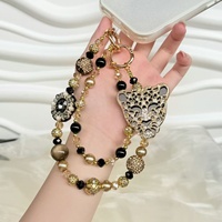 Cadena para teléfono móvil con forma de corazón, con perlas y estampado de leopardo, brillante y con diamantes, la más vendida, colgante artesanal para bolso