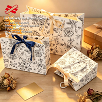 Sacs d'emballage de luxe personnalisés avec logo, sacs cadeaux en papier de haute qualité pour boutiques, sacs de shopping personnalisés avec corde torsadée