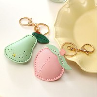 Porte-clés de luxe exquis et durable en forme de petit fruit, design mignon citron cerise, imprimé en typographie, pendentif en cuir PU, accessoire de sac pour