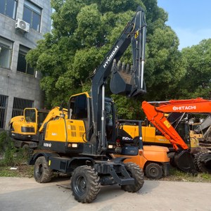 Mini-excavatrice sur pneus Hyundai 60WVS d'occasion, 6 tonnes, avec moteur et boîte de vitesses, prix bas - Product Image 2
