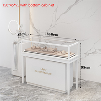 Vitrine à bijoux avec éclairage LED, support en métal et comptoir en verre pour vitrine de magasin