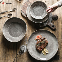 Salle à manger vintage réactive émaillée mate brillante pierre fruits dessert luxe en céramique gris japonais assiettes plates ensembles pour restaurant