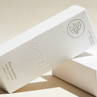 Boîte d'emballage cosmétique en papier texturé de luxe, or rose, gaufrée, petit carton rigide pour gel pour les yeux à la caféine