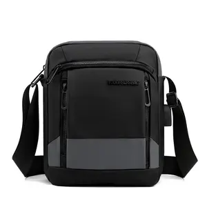 Bolso cruzado de nailon para hombre y mujer, bandolera de estilo de negocios personalizada de fábrica, sencilla, impermeable, barata, para trabajo, 2023