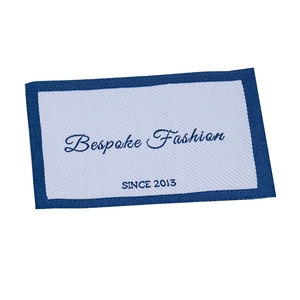 Etiqueta de tela tejida con brocado de alta densidad personalizable Etiqueta de ropa lateral de cuello elegante de doble cara para prendas de alta gama - Product Image 5