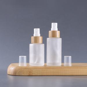 Luxury <b>30ml</b> 40ml 100ml 120ml Frosted Glass Body Oil <b>Bottle</b> with Screen Printed Bamboo Cap and Pump Sprayer for Skincare - Product Image 2
