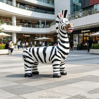 C016 Banc animalier audacieux en fibre de verre en forme de zèbre, fabriqué à la main, résistant aux rayures, en PRV, pour parcs à thème safari et expositions zoologiques