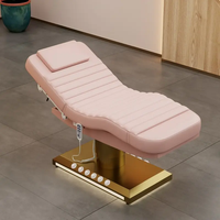 Table de massage rose moderne de luxe lit d'épilation faciale électrique cosmétique lit de cils de salon de beauté incurvé à vendre