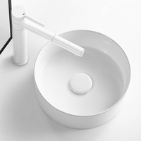 Lavabo rond en céramique blanc artistique facile à nettoyer pour hôtel moderne