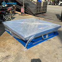 Plateforme élévatrice à ciseaux fixe robuste avec capacité de 1 à 20 tonnes, table de 1200x1200 mm pour le transfert de marchandises