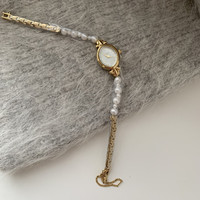 Montre française à petit cadran elliptique avec chaîne en perles naturelles, montre d'affaires, montre tendance pour femmes