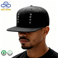 Casquette de baseball noire à visière plate style urbain avec détails œillet, fabrication OEM/ODM directe d'usine, pour activités décontractées unisexe