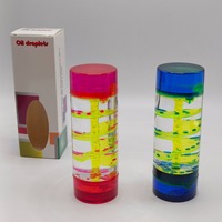 Tube sensoriel créatif en spirale avec minuterie liquide et bulles pour la relaxation et le jeu des enfants sur le bureau