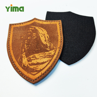 Étiquettes en cuir PU personnalisées avec logo gaufré et découpé en cuir de vachette pour vêtements de fabricant, idéales pour jeans et confection