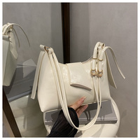 Nouveau luxe couleur unie femmes sac en cuir PU bandoulière fille collège mode épaule pour les femmes en gros