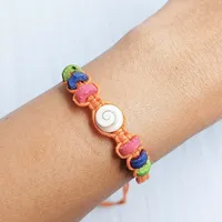 Bracelet unisexe artisanal Dk Bali réglable avec perles coquillage Œil de Shiva et pompon macramé, style décontracté/sportif, pour la mode unisexe