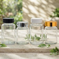 Vente en gros de bouteilles en verre rondes transparentes de 65ml 100ml bouteilles de pilules pharmaceutiques capsule de médicaments bouteilles en forme de pilules avec bouchon
