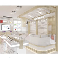 Vitrine moderne blanche et bois pour téléphones portables avec table d'expérience LED et panneau mural à crochets pour accessoires, aménagement de magasin sur mesure