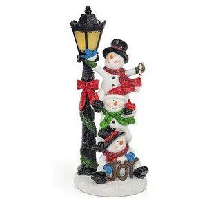 Muñeco de nieve de Navidad Santa y amigos de Navidad trío con LED que brilla intensamente poste de luz de vacaciones - Product Image 1