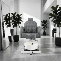 Fauteuil de pédicure gris commercial avec bassin de massage pour les pieds et repose-jambes réglable pour les centres de beauté