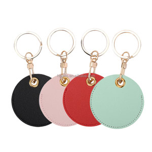Groothandel op maat gemaakte PU lederen sleutelhanger ID-kaarthouder toegangscontrole beschermhoes schattige ronde sleutelring reiscadeau voor vrouwen - Product Image 1