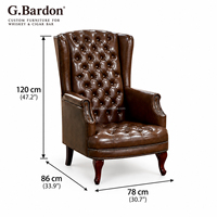 Fauteuil d'appoint rétro vintage en cuir à dossier haut capitonné avec pieds en bois pour hôtel et bar