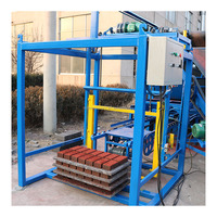 Machine automatique de fabrication de blocs de pavés creux et pleins QT4-15 avec garantie d'un an, machine à briques en ciment à faible investissement