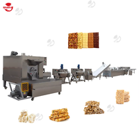 Pour les petites entreprisesmachine de découpe cassante d'arachide fabricant de barre de chocolat de protéine machine automatique de barre de noix faisant la ligne de production
