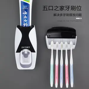 Produtos quentes dispositivo automático de apertar pasta de dentes suporte de escova de dentes de parede sem perfuração suporte de pasta de dentes de banheiro