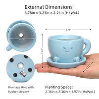 ROOGO Pot de fleurs en résine en forme de tasse à thé avec visage souriant, jardinière créative pour plantes succulentes, pot de fleurs en forme de cafetière de dessin animé pour ornement de table