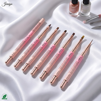 Ensemble de pinceaux à ongles en métal rose ajouré avec manche découpé et poils en nylon pour gel UV et acrylique, idéal pour la manucure en salon