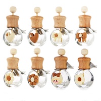 Flacon de parfum personnalisé de dessin animé mignon 8ml 10ml 15ml Flacon diffuseur de dessin animé pour le parfum de voiture avec couvercles en bois