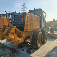 Niveleuse Caterpillar 140H d'occasion avec moteur et pompe Mitsubishi, composants essentiels de qualité garantie, vente à prix réduit