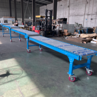 Convoyeur à gravité extensible robuste X-YES pour le déchargement de véhicules porte-conteneurs de toutes tailles Système de chargement Camion