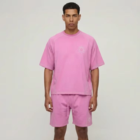 Ensemble de sport 2 pièces pour homme en coton respirant rose uni avec surpiqûres contrastées, coupe ample, short et t-shirt, vente en gros