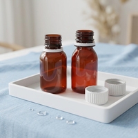Bouteille vide de solution orale anti-vol rotative à pression transparente brune en PET de 60 ml avec étiquette privée personnalisée