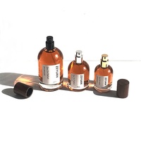 Fabricante de botellas de perfume vacías 30ml 50ml 100mL Cilindro de fragancia Botellas de vidrio redondas con tapa de madera