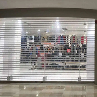Porte à enroulement motorisée automatique en PC transparent pour entrée de bâtiment
