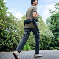 Exosquelette de marche pour la rééducation des membres inférieurs, exosquelette de marche portable et adaptable pour personnes âgées et handicapées
