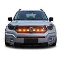 Grille de calandre OLIVER Tank 400 Hi4T avec petit éclairage diurne LED jaune à clipser sur le côté avant