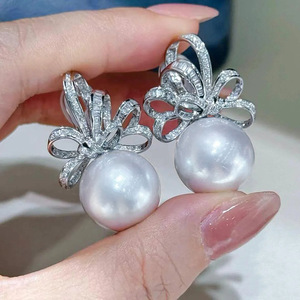 Orecchini a perno con fiocco e perline per donna, design dolce ed elegante, accessori per l'orecchio da indossare tutti i giorni - Product Image 3